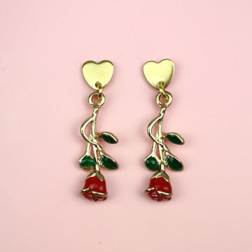 Gold plated heart shaped stainless steel studs with a red rose charm