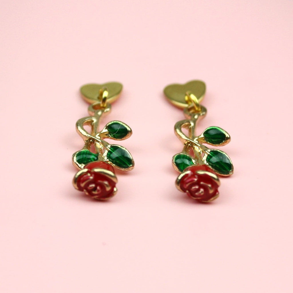 Gold plated heart shaped stainless steel studs with a red rose charm