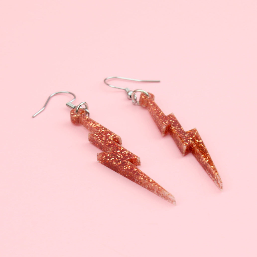 Orange Glitter Lightning Bolt Earrings - Sour Cherry