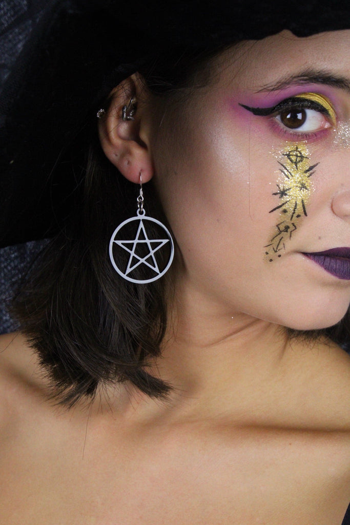 Model wearing Pentacle Earrings