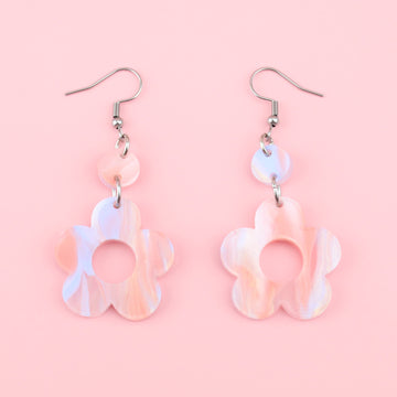 Pastel peach and blue perspex flower charms with cut out middle on stainless steel earwires