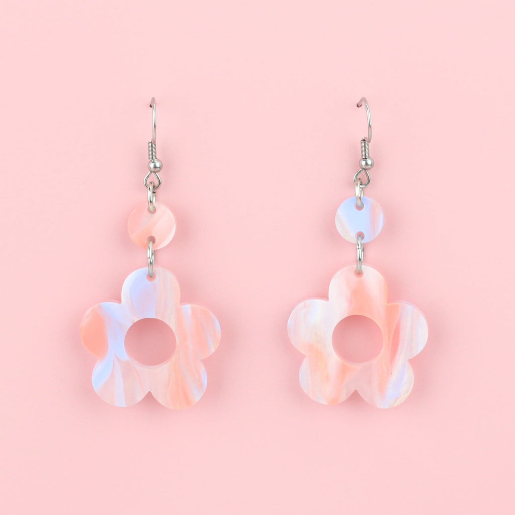 Pastel peach and blue perspex flower charms with cut out middle on stainless steel earwires