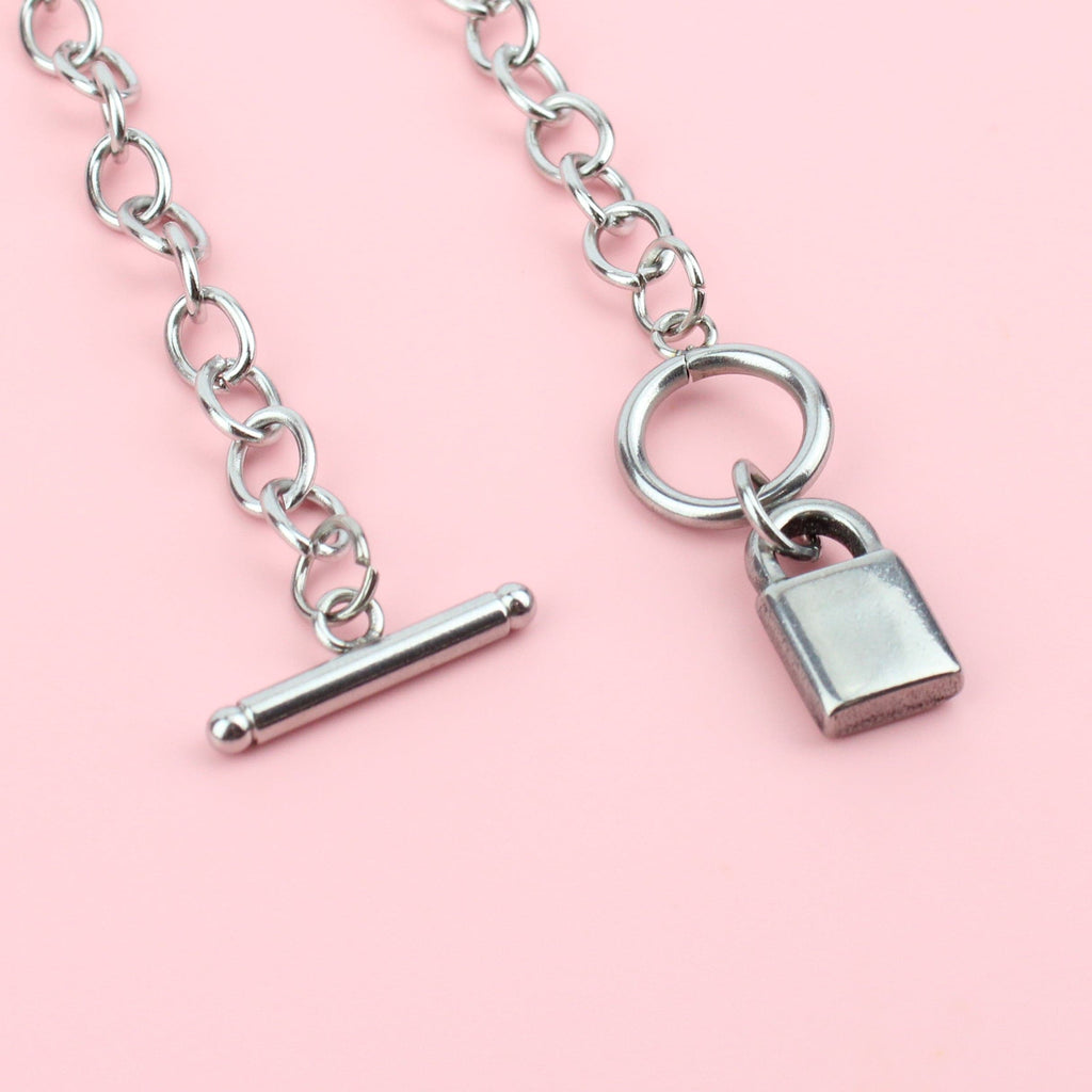 Padlock charm on Stainless Steel oval chain necklace