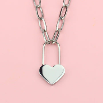 Oval chain stainless steel necklace with a heart lock charm