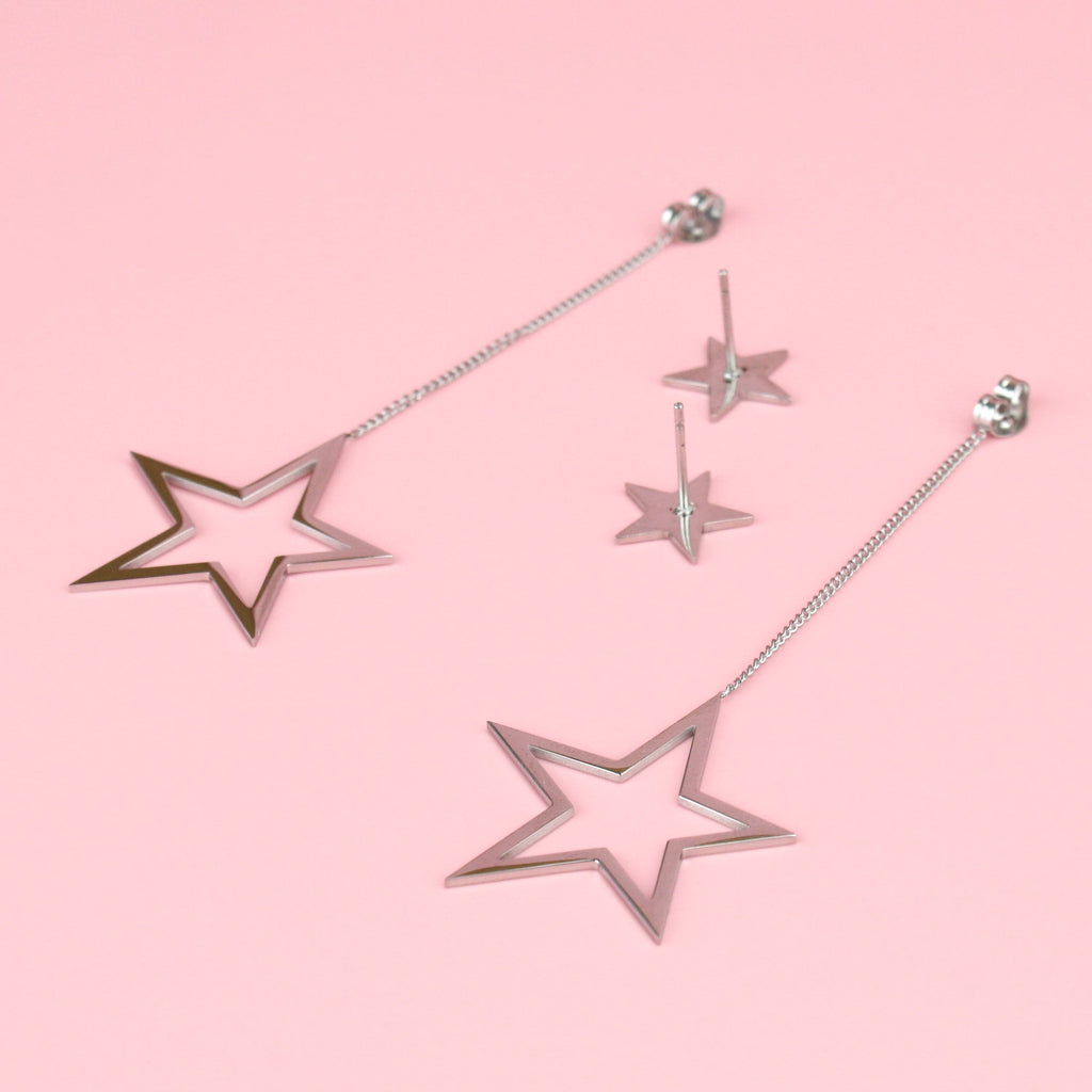 Cut out stars suspended from a dangly chain and star studs