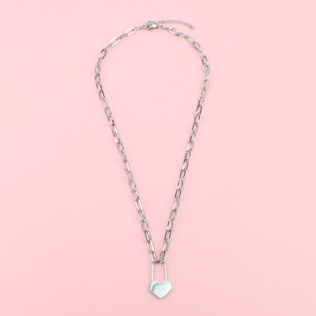 Oval chain stainless steel necklace with a heart lock charm