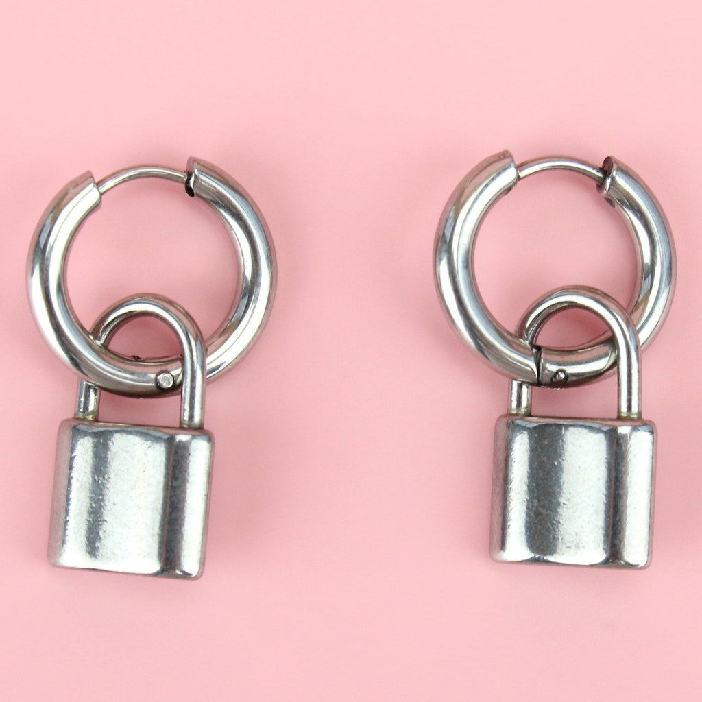 Stainless steel hoop earrings with a padlock charm