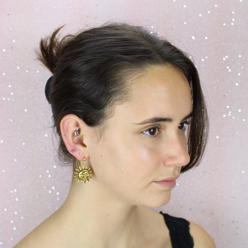 Model wearing Moon & Sun Stud Earrings (Gold plated)