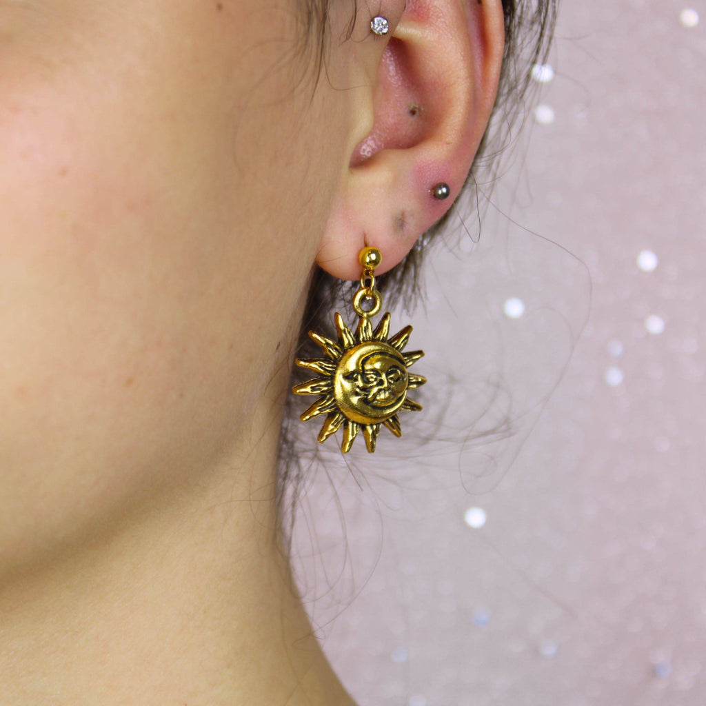 Model wearing Moon & Sun Stud Earrings (Gold Plated)