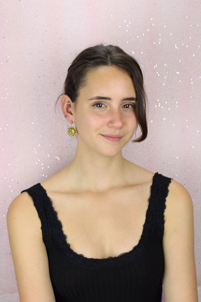 Model wearing Moon & Sun Stud Earrings (Gold plated)