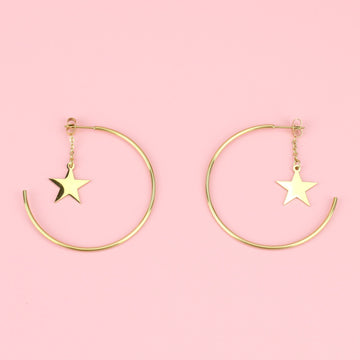 Gold plated stainlss steel hoop with a star dangling from the earring back