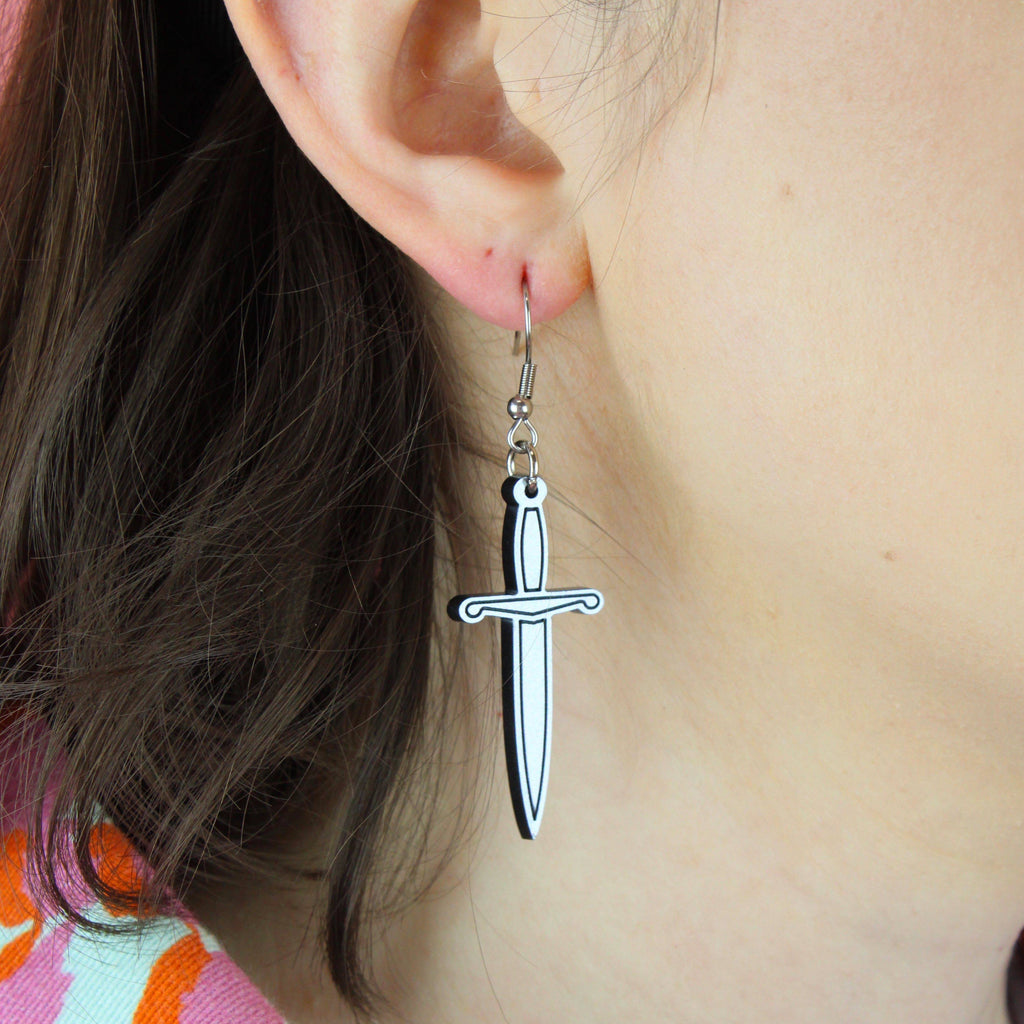 Model wearing Silver Dagger Earrngs