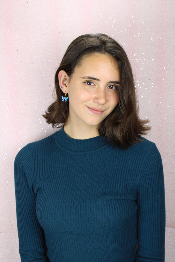 Model wearing the Bright Blue Butterfly Earrings 