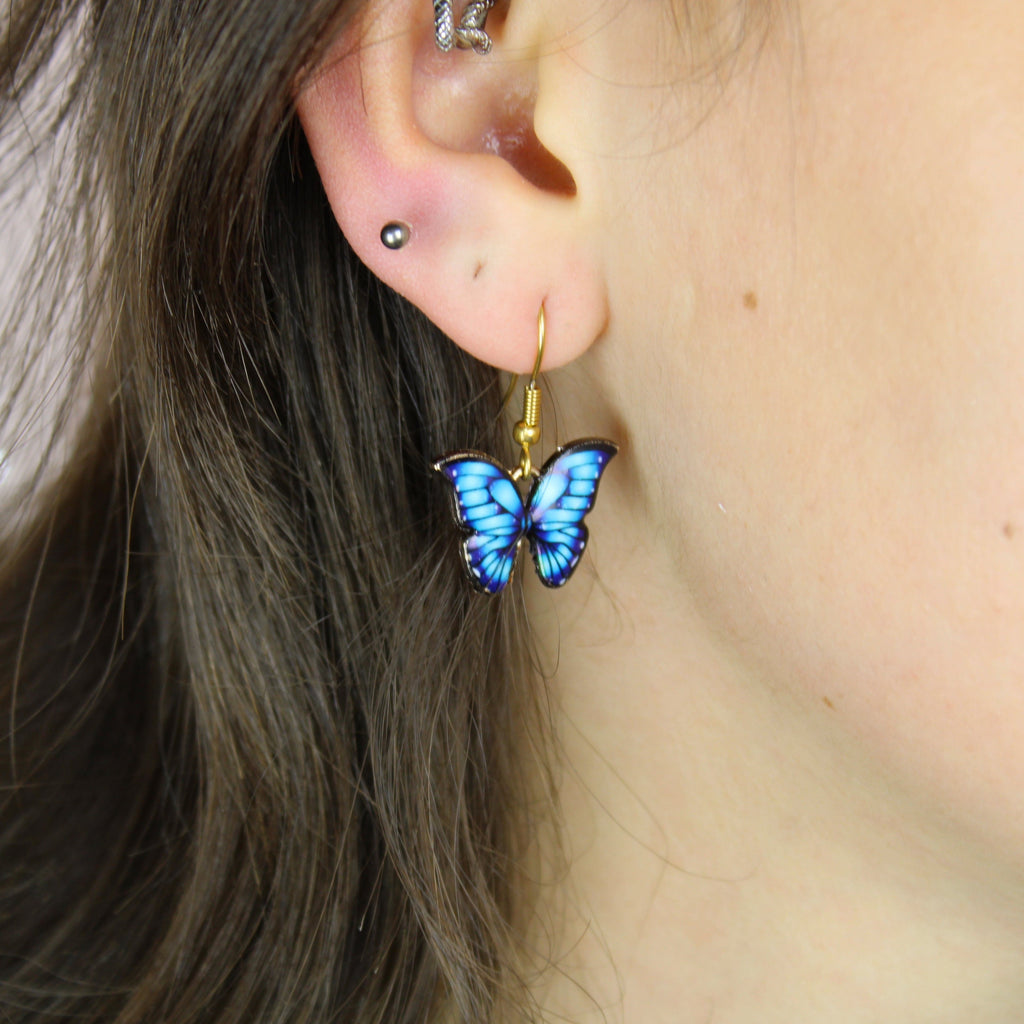 Model wearing the Bright Blue Butterfly Earrings 