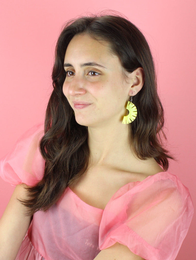 Model wearing the Halved Pineapple RIng Earrings