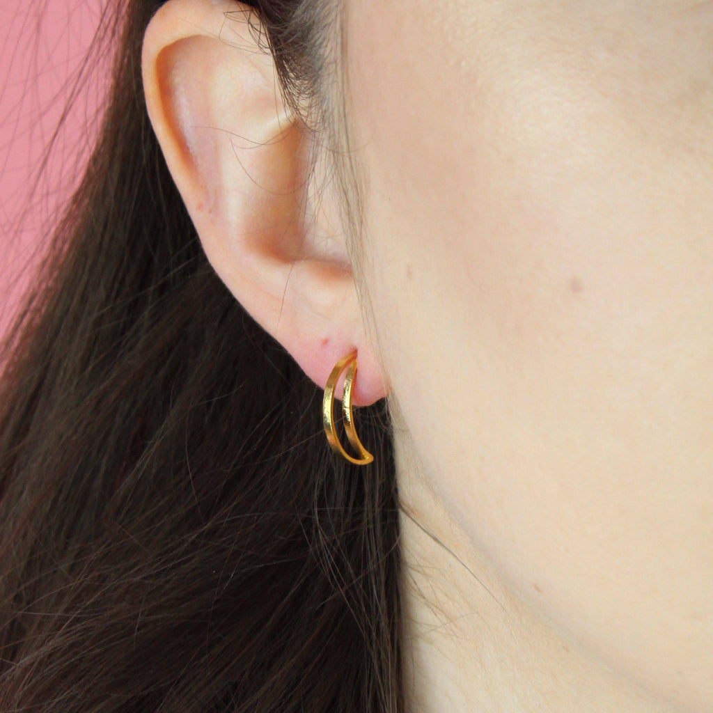 Model wearing Dainty Crescent Moon Hoops (Gold Plated)