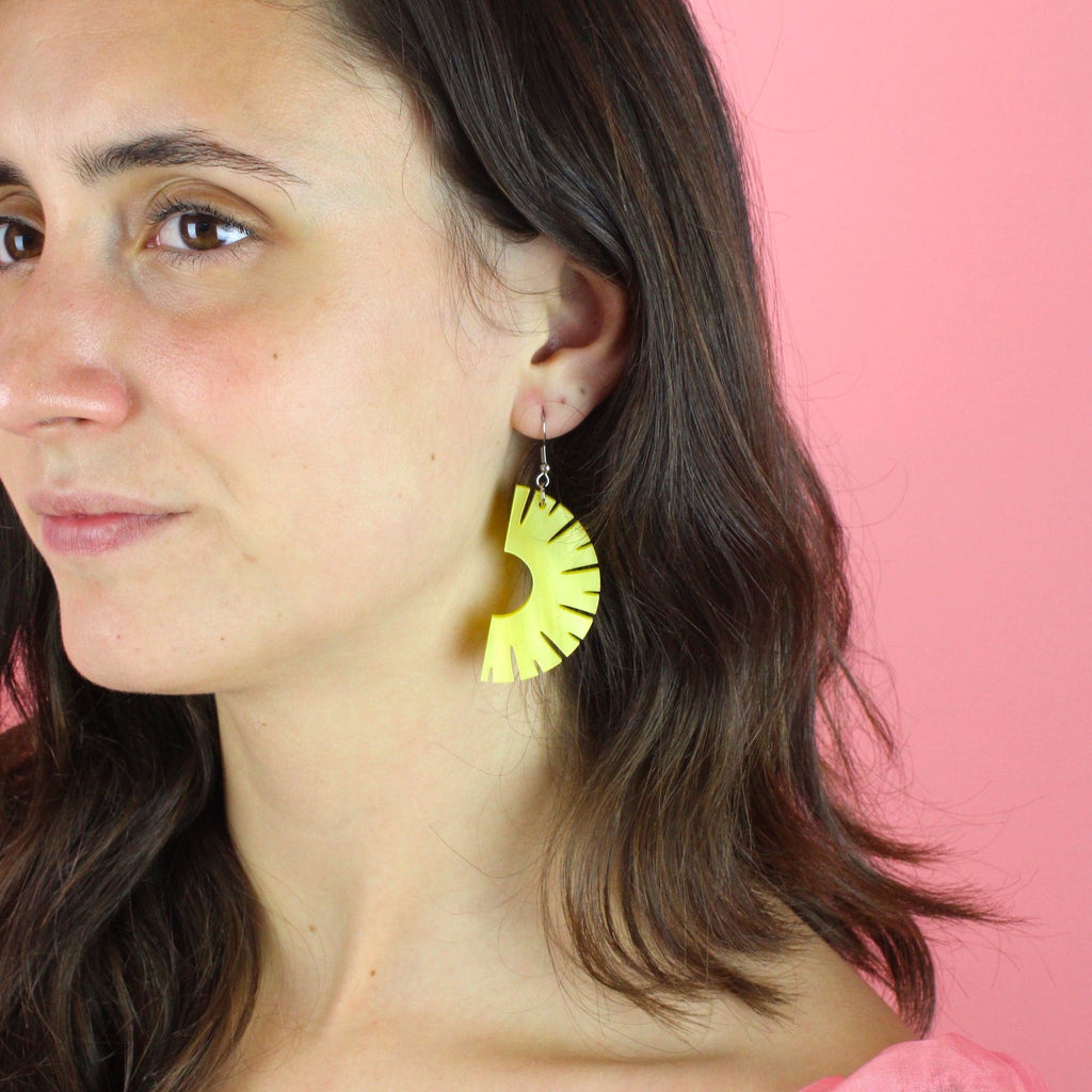 Model wearing the Halved Pineapple RIng Earrings