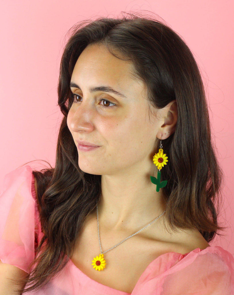 Model wearing Tall Sunflower Earrings