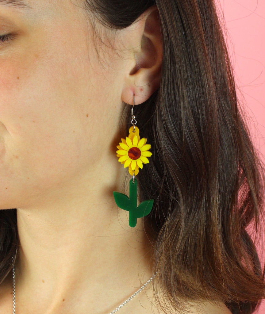 Model wearing Tall Sunflower Earrings
