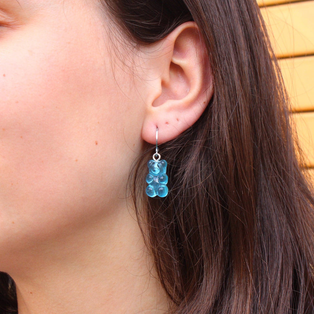 Model wearing Blueberry Gummy Bear Earrings