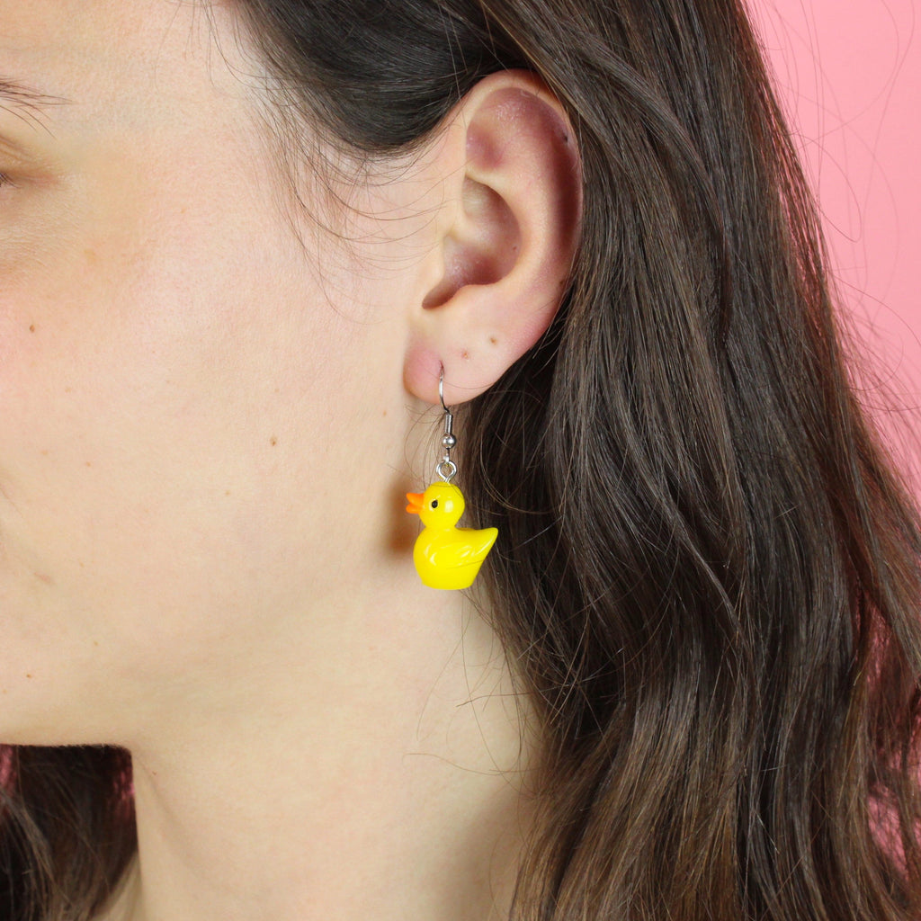 Model wearing Hook-A-Duck Earrings