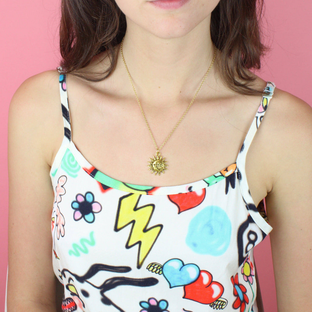 Model wearing Moon and Sun Necklace (Gold Plated)