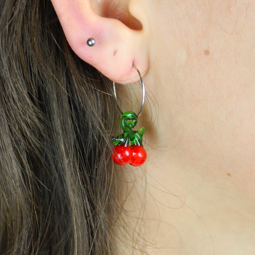 Ear wearing Glass Cherry Hoop earrings