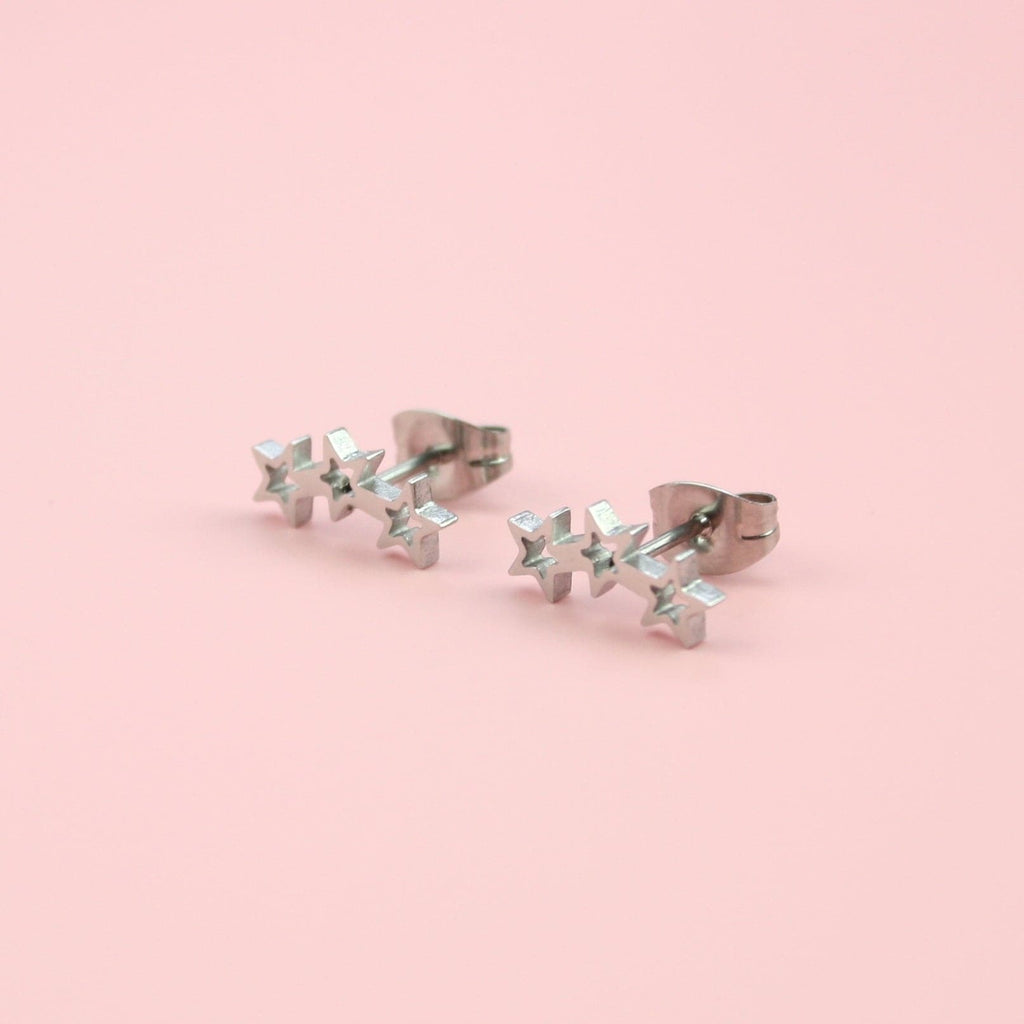 Stainless steel studs featuring a cut out triple star design