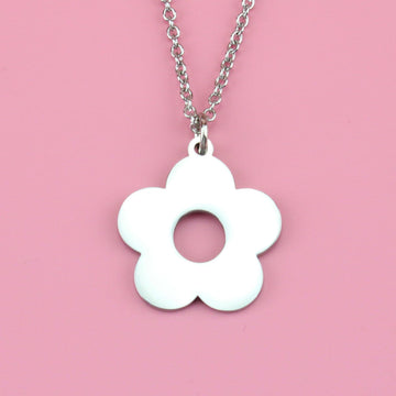 Stainless steel chain featuring flower charm with a cut out middle