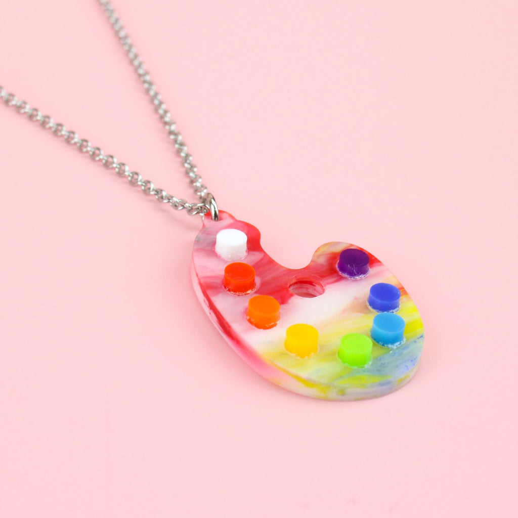 Art palette made out of marble acrylic with perspex paint spots on stainless steel chain