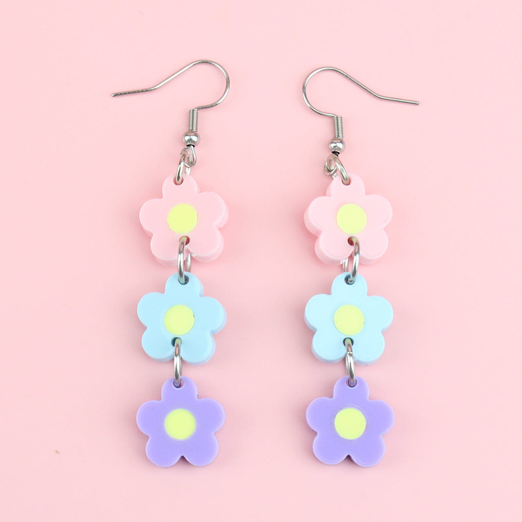 Pastel shades of pink, blue and purple Perspex flower charms on stainless steel earwires