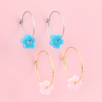 2 pack of hoop earrings - silver hoops with blue acrylic flower charms and gold hoops with baby pink acrylic flower charms