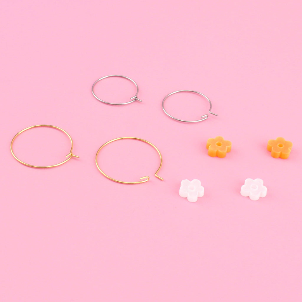 2 pack earring set showing the hoops and flower charms separately