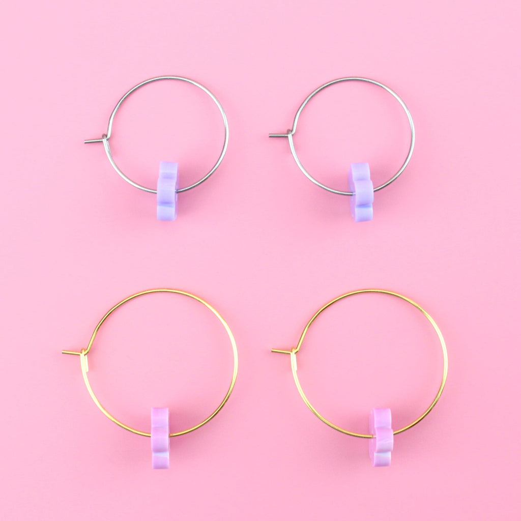 2 pack earring set - silver hoops with purple flower charms and gold hoops with pink flower charms