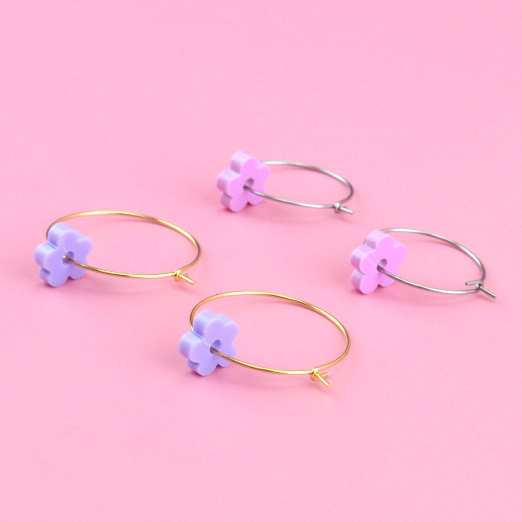 2 pack earring set - silver hoops with purple flower charms and gold hoops with pink flower charms