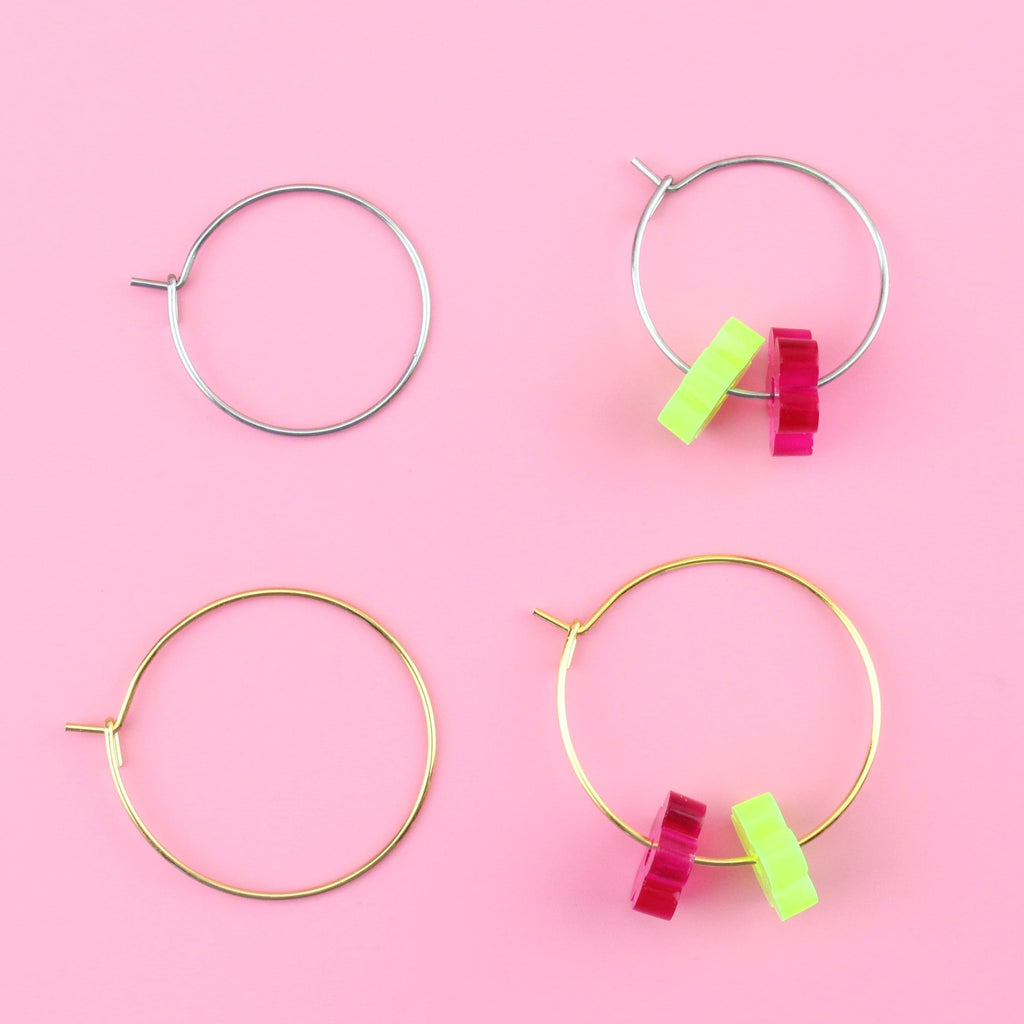 Showing 2 flower charms on one earring