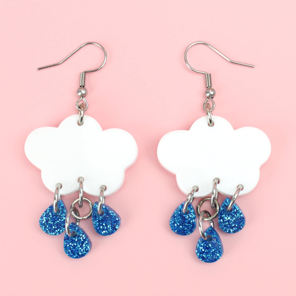 White cloud earrings with blue glitter raindrop charms on stainless steel ear wires