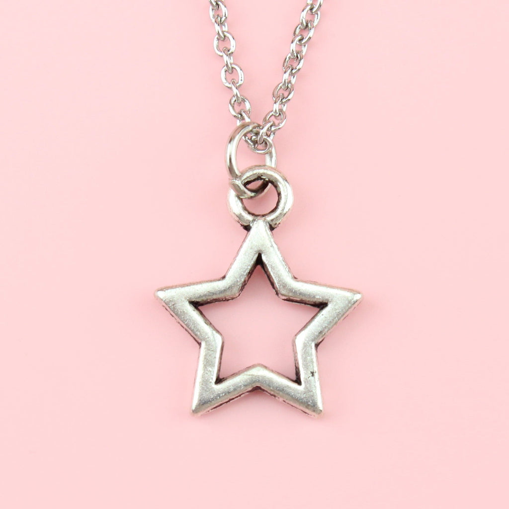 Cut out star pendant on a stainless steel chain