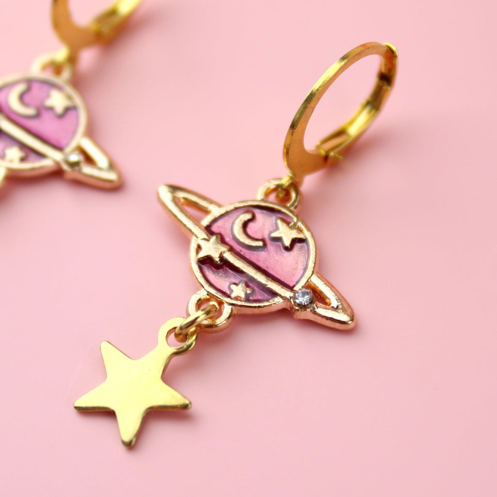 Purple and gold planet and star charms on Gold Plated Stainless Steel hoops
