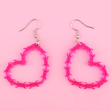 Pink barbed wire style heart shaped earrings on stainless steel earwires