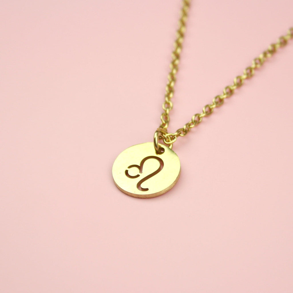 Gold Plated Circle Charm with Cut Out Leo Symbol on a Gold plated Stainless Steel chain