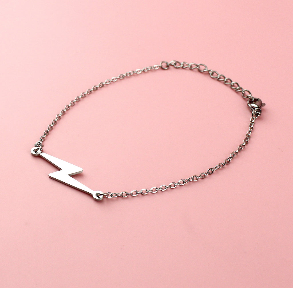 Stainless steel bracelet with lightning bolt charm