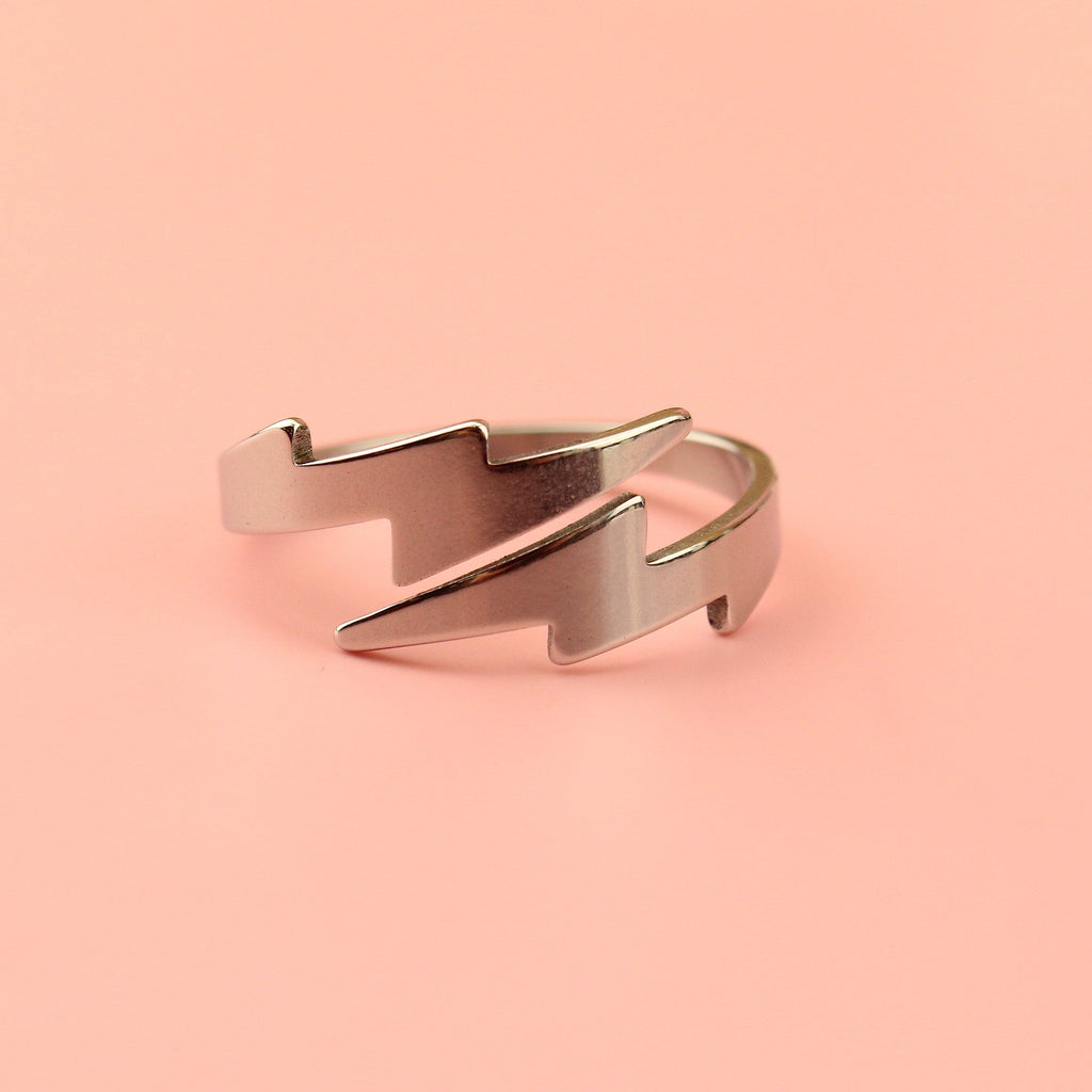 Stainless steel Loop dee loop style ring featuring lightning bolts at the front