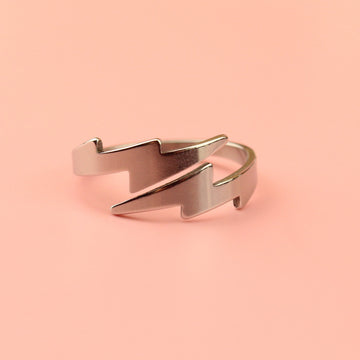 Stainless steel Loop dee loop style ring featuring lightning bolts at the front