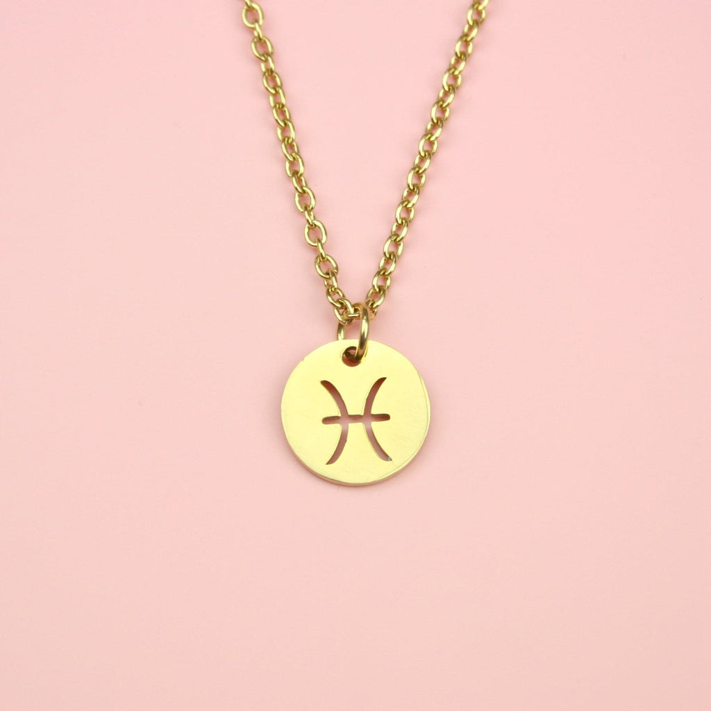 Gold plated stainless steel necklace featuring a gold circular pendant with the Pisces symbol