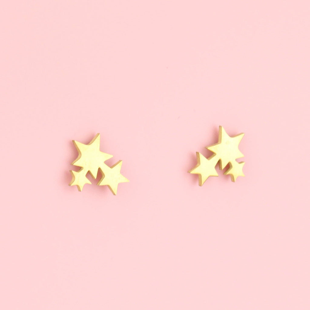 A cluster of three stars on gold plated stainless steel studs