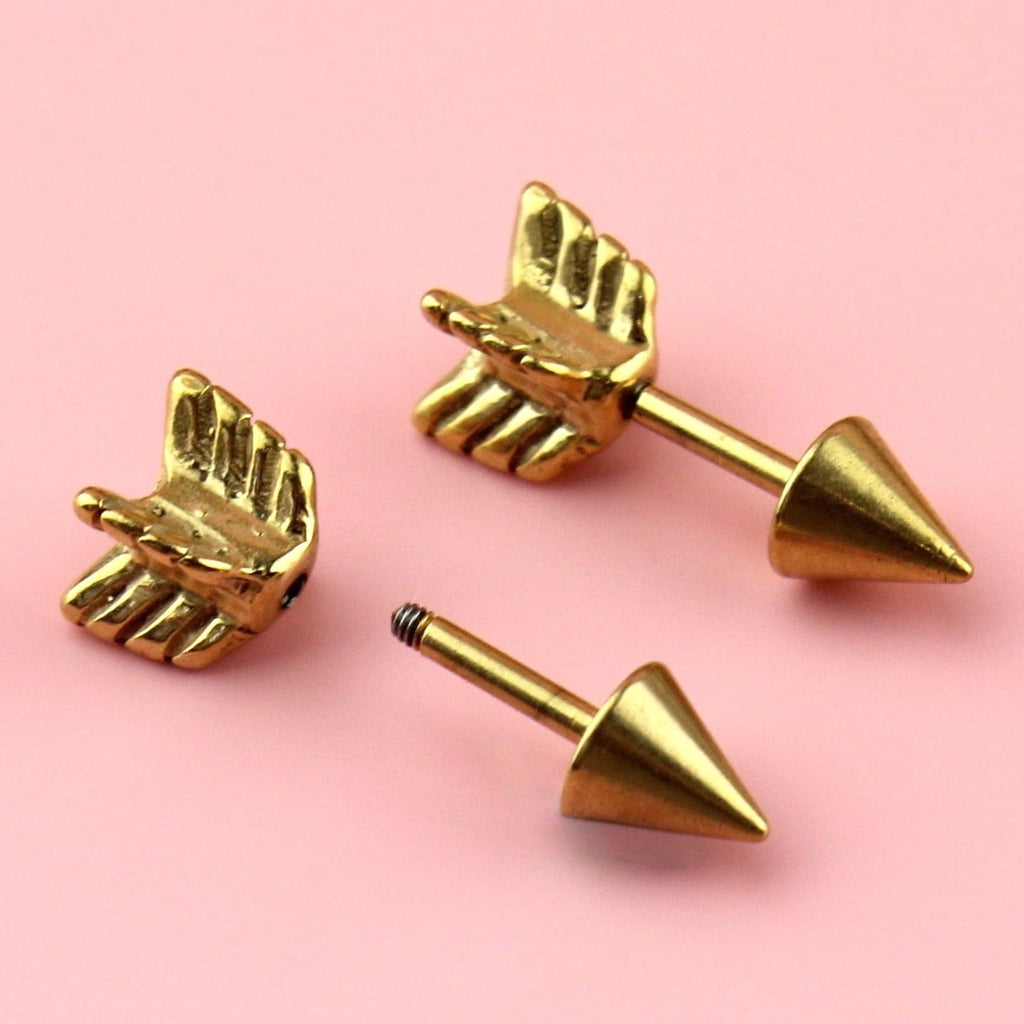 Gold Plated Stainless Steel studs in the shape of an arrow with a scew-off back