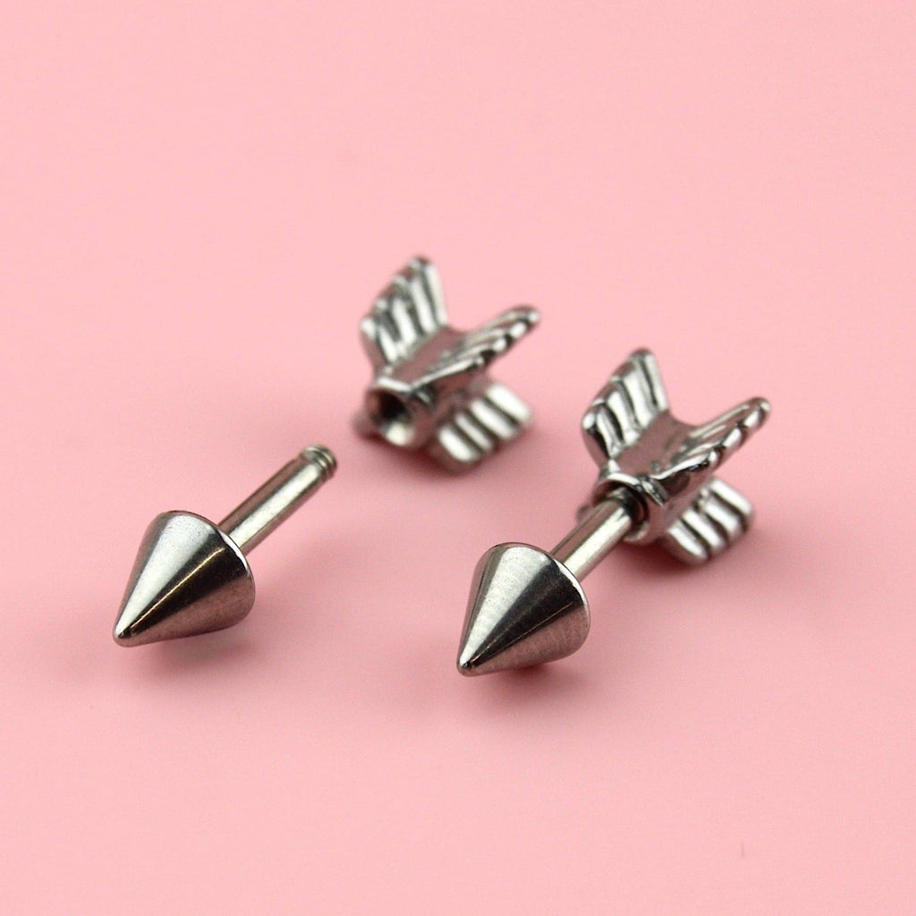 Stainless steel studs in the shape of an arrow with a scew-off back