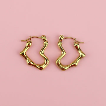 Gold plated stainless steel heart shaped hoops that look melted