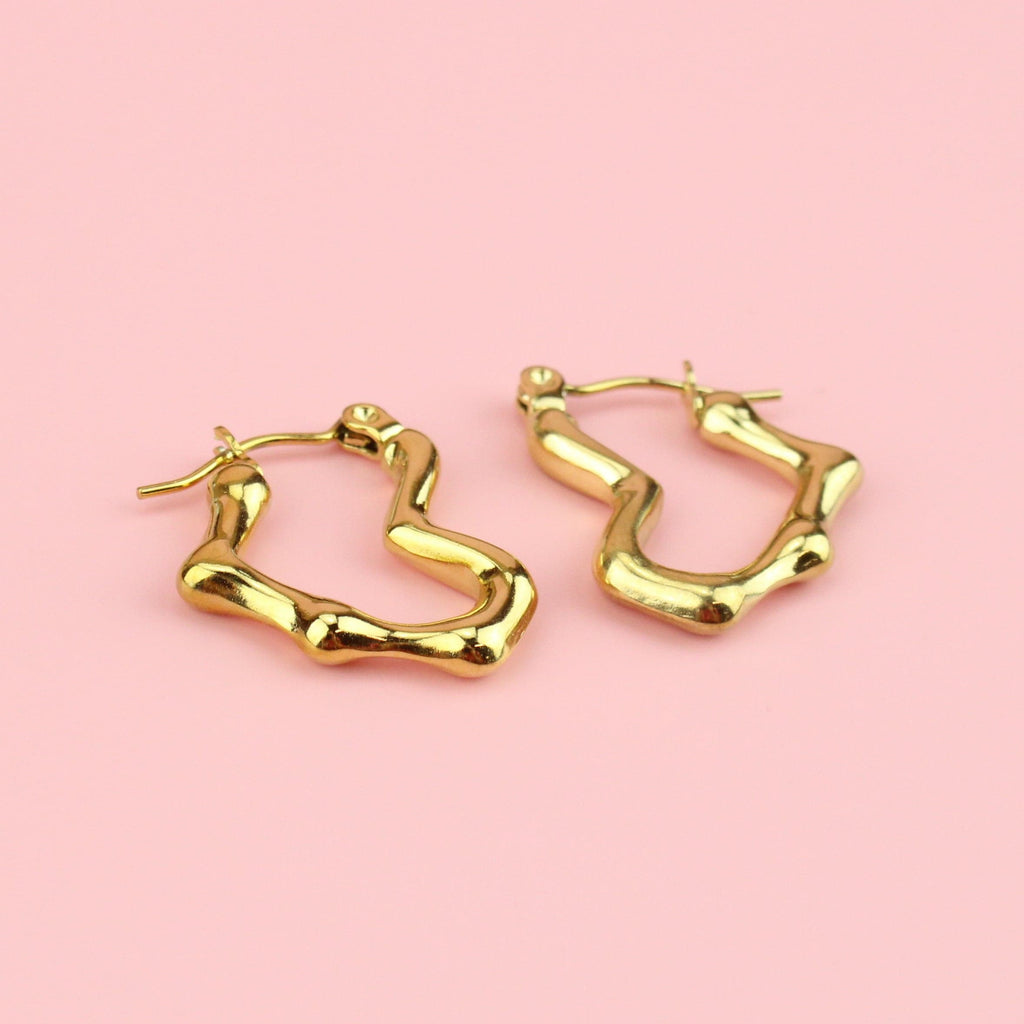 Gold plated stainless steel heart shaped hoops that look melted